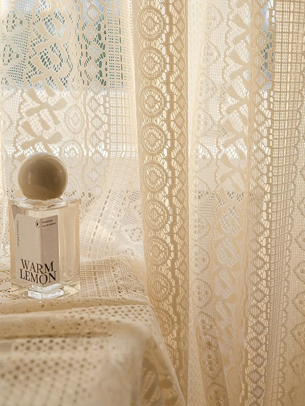Voilage bohème beige à motifs géométriques